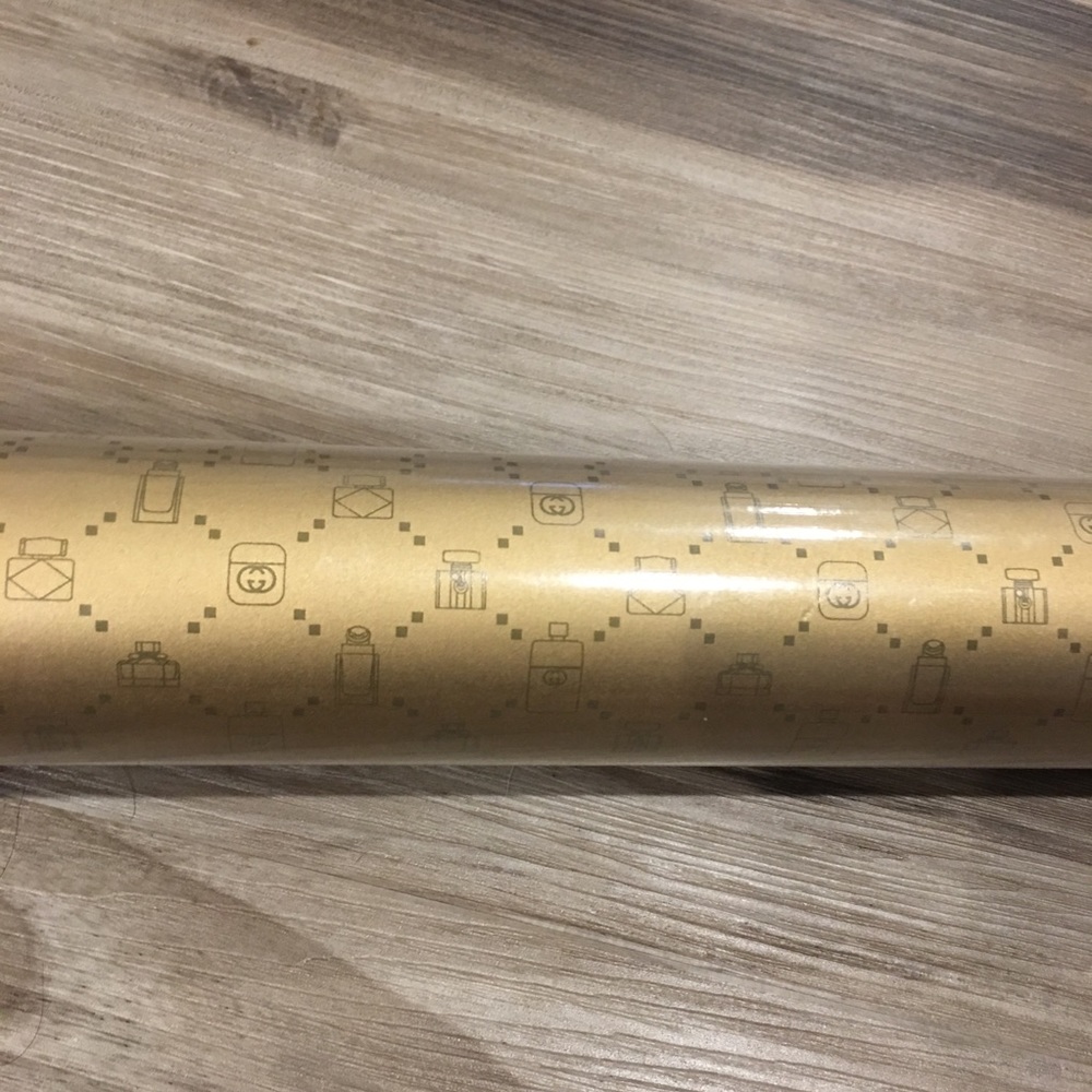 Authentic Gucci gold wrapping paper